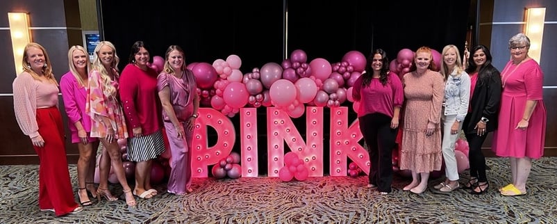 NLS team members celebrate Breast Cancer Awareness Month
