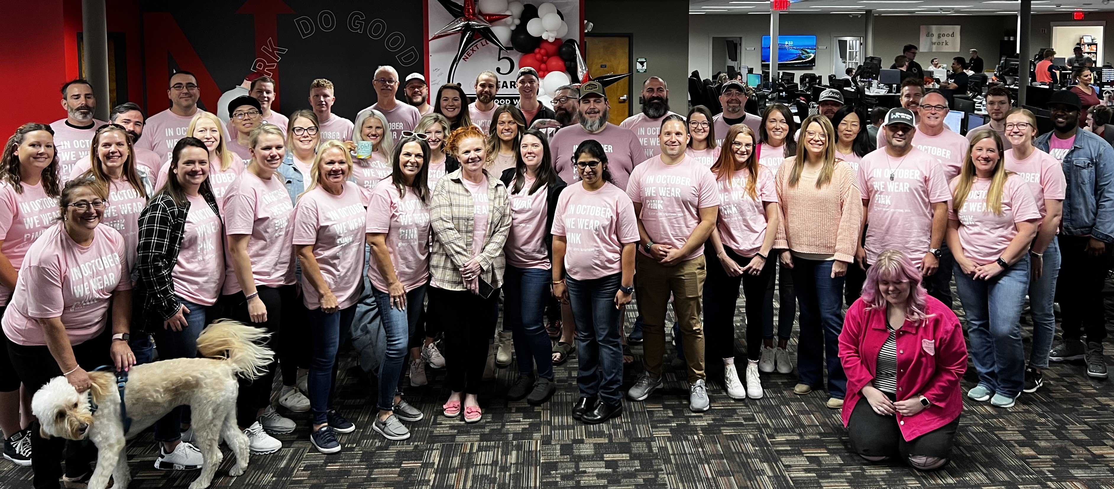 NLS employees wear pink shirts to show their support for Breast Cancer Awareness